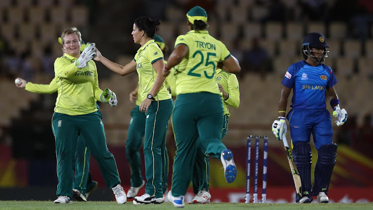 Proteas' senior women's national team players celebrate a wicket during their opening Women's World Twenty20 against Sri Lanka in St Lucia in the West Indies.