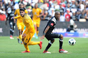 Leonardo Castro of Kaizer Chiefs in action with Gladwin Shitolo of Orlando Pirates during the Absa Premiership match between Orlando Pirates and Kaizer Chiefs at FNB Stadium on March 03, 2018 in Johannesburg, South Africa. 
