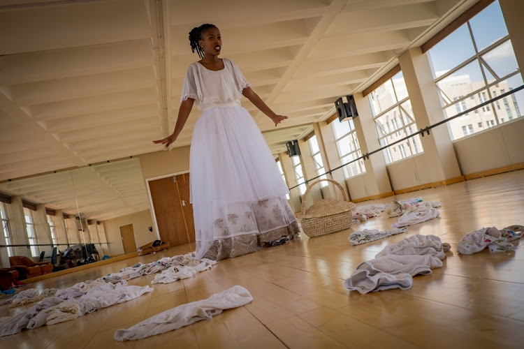 Artist Nondumiso Msimanga models her ‘wedding’ dress made out of worn underwear on November 4, 2016