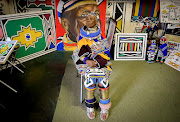 World renowned African artist Mam' Esther Mahlangu  poses for a portrait in her art studio which houses some of the artwork she's made over the years.