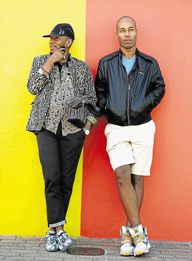 CAN'T SIT STILL: Mos Def (aka Yasiin Bey), left, with Whosane in the Bo-Kaap Picture: ESA ALEXANDER