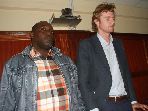 Francis Mwanthi and Jack Wolf in court yesterday. The High Court in Nairobi dismissed an application challenging their release on bond /PHILIP KAMAKYA