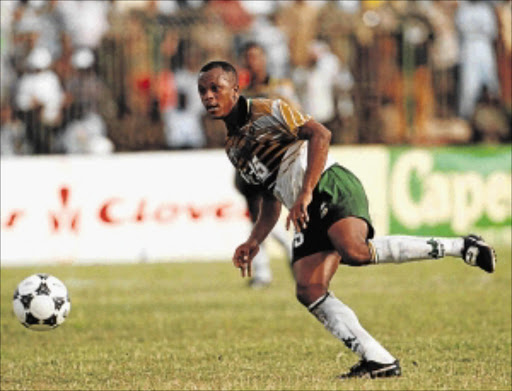 PRECISE : Former Bafana midfielder Doctor Khumalo scores against Cameroon in SA's first game after readmission to international football in 1992 Photo: Gallo Images