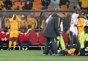 Kaizer Chiefs midfielder Willard Katsande reacts in anguish after witnessing a horrific injury to his teammate Joseph Molangoane (lying on floor) during the MTN8 quarterfinal 3-0 win over Free State Stars at FNB Stadium in August 2018.