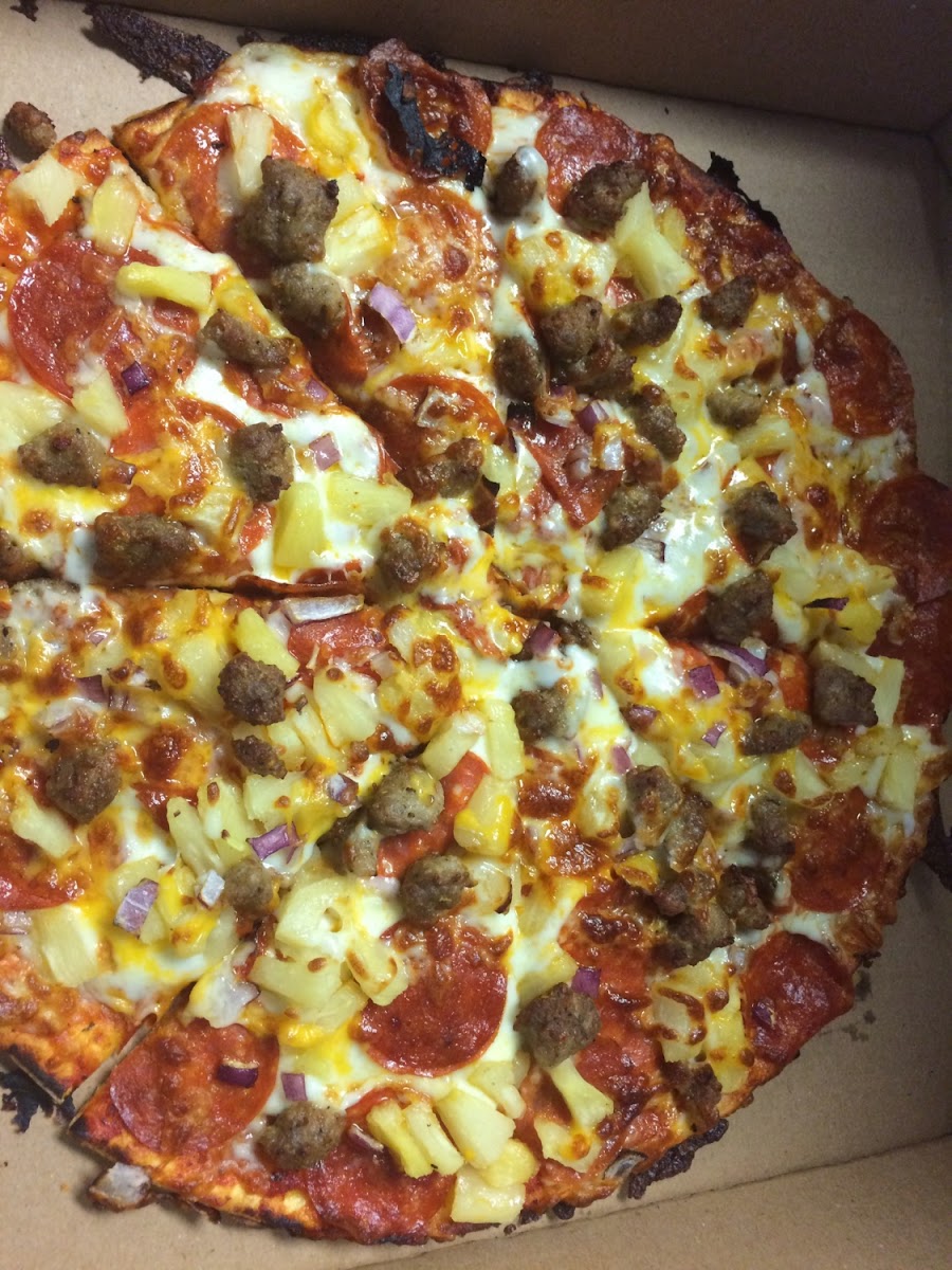 Pepperoni pineapple onion & sausage! The crust could have been a bit crunchier for my taste - but it was still a great pizza! I asked them to cook it longer for me and they did!!!!  Friendly understanding staff :)