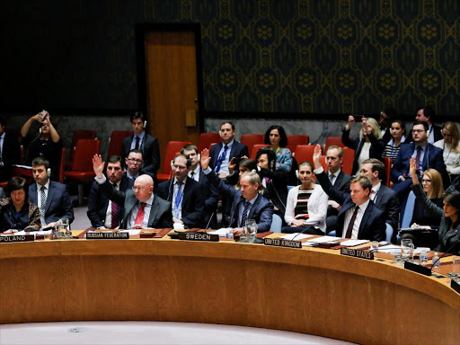 Members of the United Nations Security Council vote for ceasefire to Syrian bombing in eastern Ghouta, at the United Nations headquarters in New York, U.S., February 24, 2018.