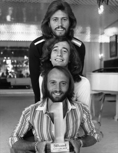 Publicity photo of the Bee Gees for the television special Billboard #1 Music Awards. Top to to bottom: Maurice, Robin and Barry.