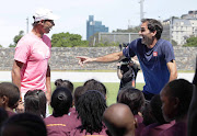 Rafael Nadal and Roger Federer clown around  at a 'learning through play' session with children from Hangberg Pre-Primary School in Hout Bay at Green Point Athletics Stadium on February 7 2020.