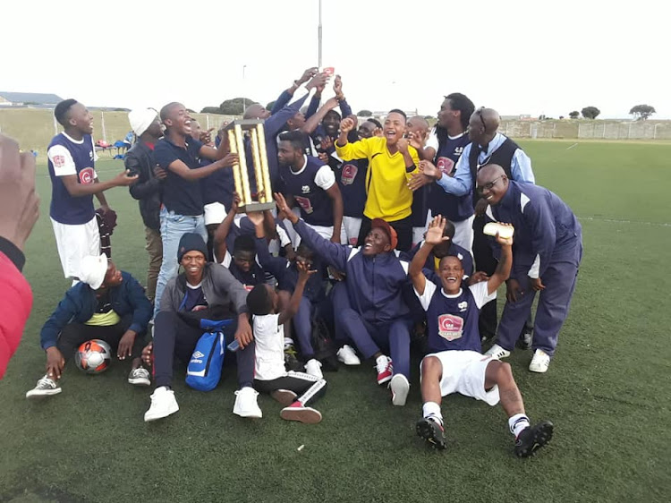 The Heldersroom FC team from Helderstroom Prison near Caledon celebrate winning the Safa-Overberg region's SAB League.