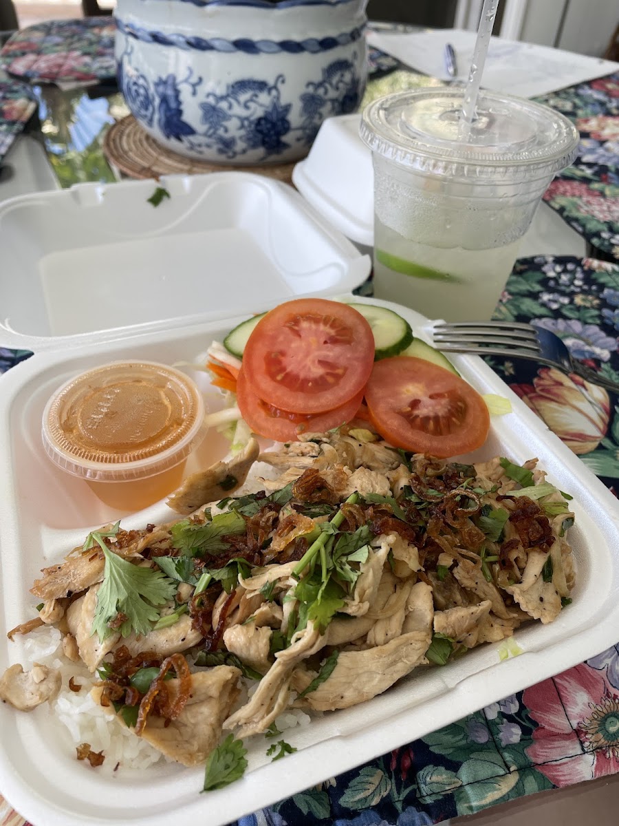 Takeout chicken rice bowl with limeade