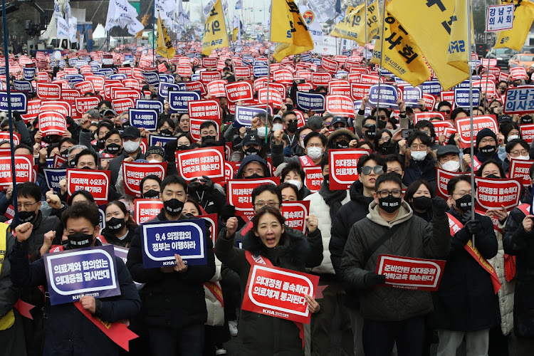 South Korean doctors participate in a rally against the government's medical policy on March 03, 2024 in Seoul, South Korea.