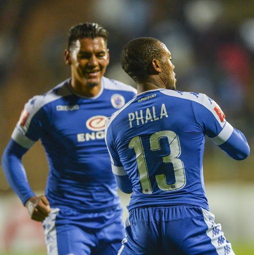 SuperSport United midfielder Thuso Phala (R) celebrates with teammate Clayton Daniels after scoring a goal during the Absa Premiership match against Bidvest Wits at Bidvest Stadium on April 25, 2017 in Johannesburg, South Africa.