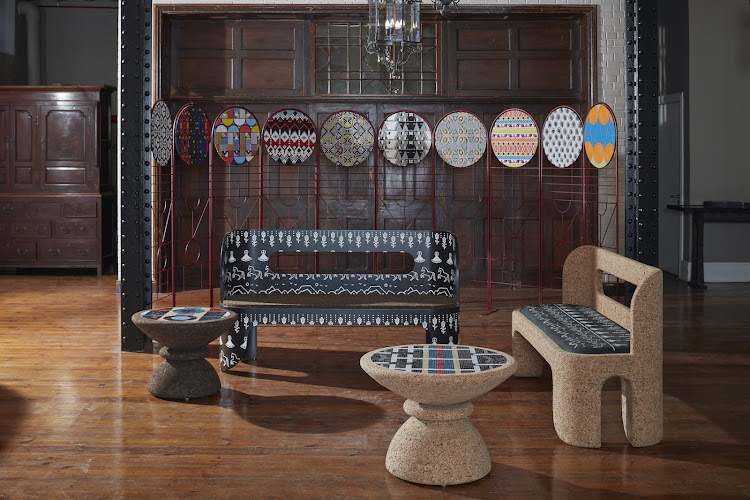A taste of what's on show at the Nando's Right here, Right Now! exhibition: Dokter and Misses screen with patterned panels designed by the finalists of the 2018 Nando’s Hot Young Designer contest, which were beaded by Qaqambile Bead Studio and HUB. Bodulo benches by Khosi Leteba, manufactured by Wiid Design. Cork side tables by Wiid Design, featuring patterns by Glorinah Mabaso, with mosaics by HUB. All collaborations facilitated by Clout/SA.