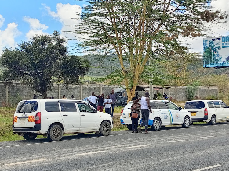 Motorists parked by the roadside during road safety compliance checks on Nairobi-Mombasa highway, March 27, 2024.