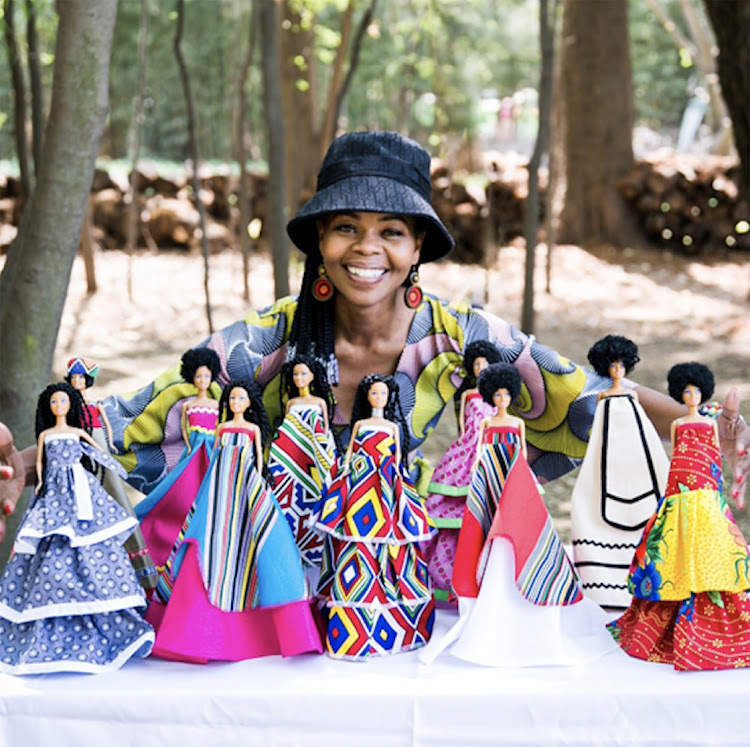 Mmule Ramothibe Ka Pityana with her Nandikwa Simply Beautiful dolls.
