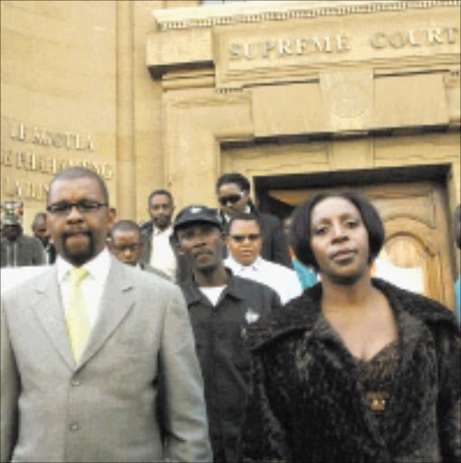 Dali Mpofu and his wife Mpumi outside the Johannesburg High court.\nPic:Lucky Nxumalo/ 08/07/08. © Sowetan.