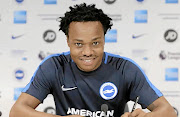 Percy Tau is happy with his Brighton deal as well as loan move to Belgian lower division.