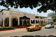 Sudanese drive past the Grand Holiday Villa hotel in the Sudan's capital Khartoum on October 20, 2012. File photo.