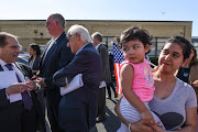 Congressmen Jerrold Nadler, Albio Sires and Bill Pascrell stand next to Sharon Chajon and her 2 year old daughter during the protest against recent US immigration policy that separates children from their families when entering the United States as undocumented immigrants. 