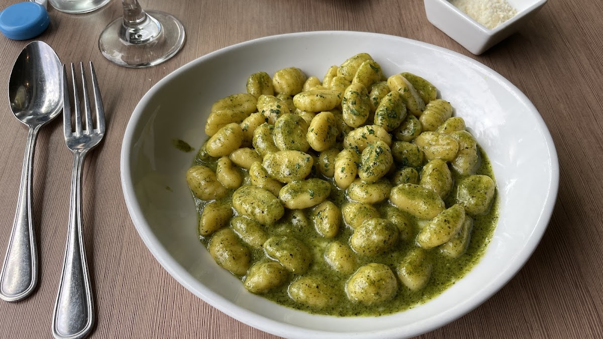 GF housemade Gnocchi with pesto sauce. Fantastic, pillowy and tender! Very large portions, expect some incredible leftovers.