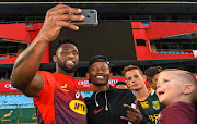 Springboks captain Siya Kolisi takes selfies with the fans during fan activation day at Loftus Versfeld Stadium in Pretoria on August 13 2019.