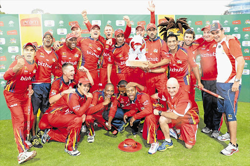 The Lions celebrate victory in the RAM Slam T20 Challenge final against the Nashua Titans at Bidvest Wanderers stadium in Johannesburg yesterday. The team had not won a tournament since the 2006-2007 season
