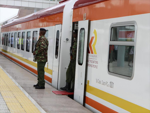 Police officers are seen manning the entrance to an SGR train at the Mombasa terminus, May 2017. /MONICAH MWANGI