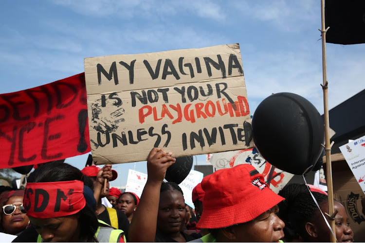 Women in Pietermaritzburg take part in the #TotalShutdown march on August 1, 2018.