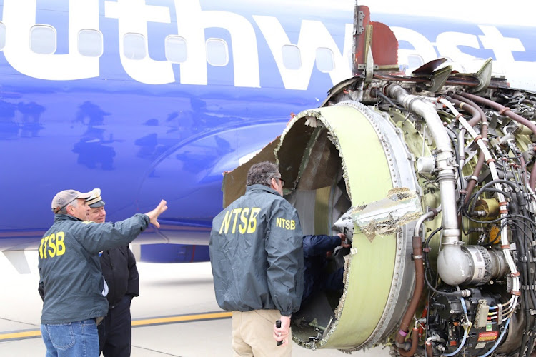 US NTSB investigators are on scene examining damage to the engine of the Southwest Airlines plane in Philadelphia, Pennsylvania, US on April 17, 2018.