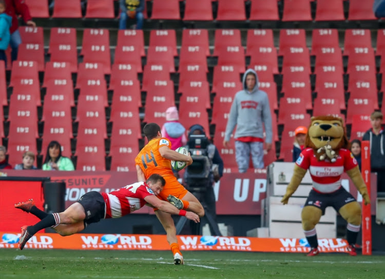 Ruan Combrink makes a try saving tackle during a Super Rugby quarterfinal match betwee the Emirates Lions and the Jaguares at Emirates Airlines Park on July 21, 2018 in Johannesburg, South Africa.