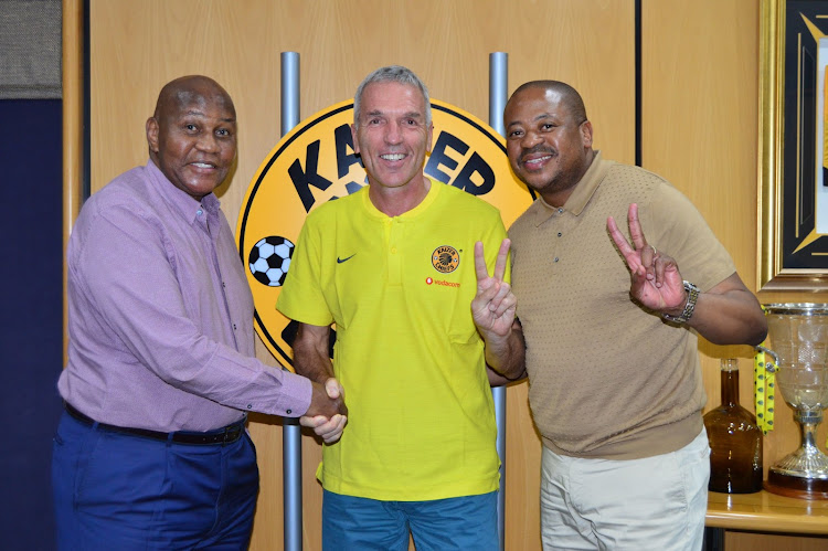 Kaizer Chiefs coach Ernst Middendorp (C) along side executive chairman (L) Kaizer Motaung and football manager Bobby Motaung (R).