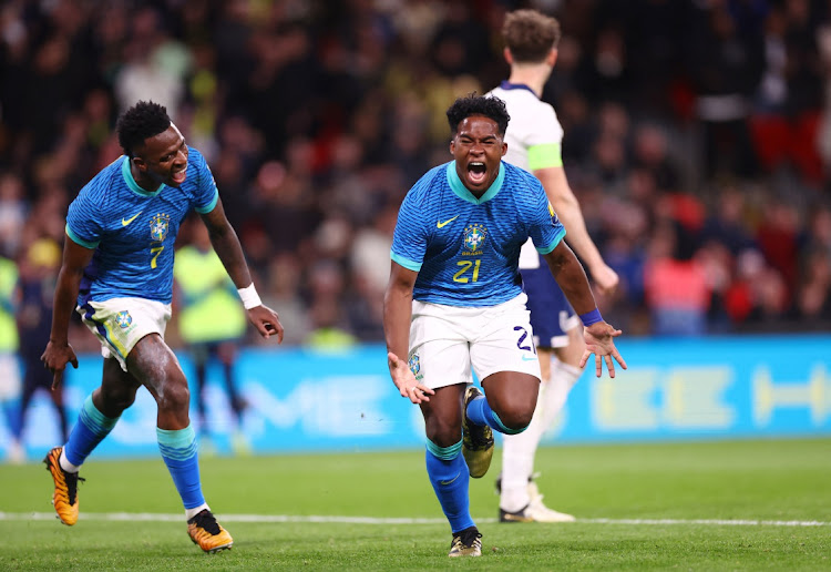 Brazil's Endrick celebrates scoring with teammate Vinicius Junior in the international friendly against England at Wembley Stadium in London on Saturday.