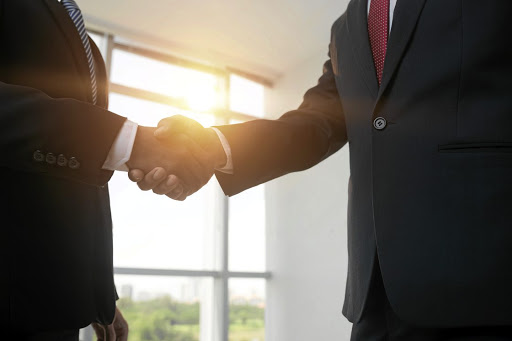 Joining hands: The public and private sectors can achieve more when working together. iStock