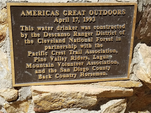 A plaque on a stone drinking fountain located where the Pacific Crest Trail runs through the Burnt Rancheria campground in the Cleveland National Forest. Americas (sic) Great Outdoors April 17,...