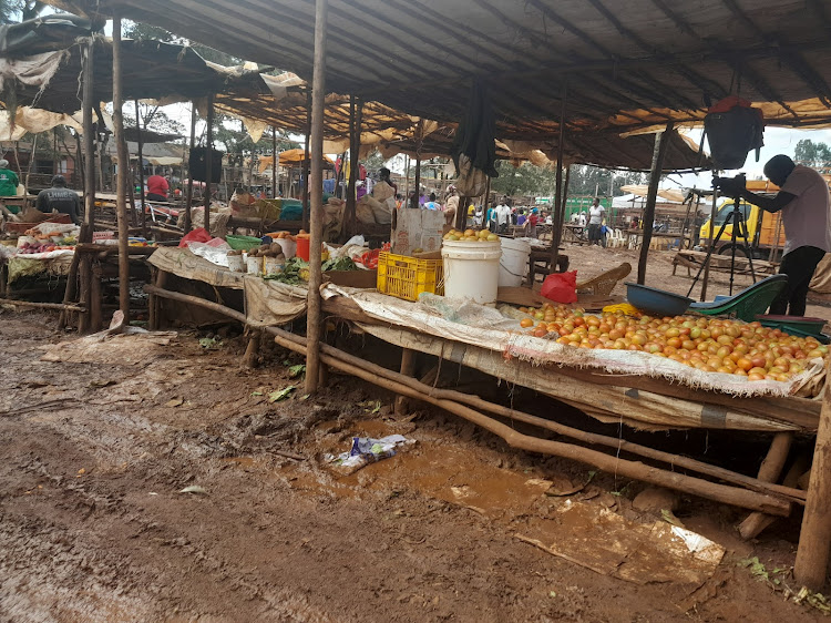 Traders get on with business at the Gatukuyu market in Gatundu North. The market has been earmarked for upgrade