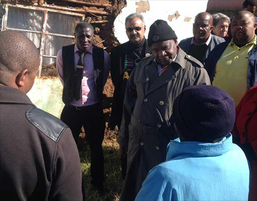 REACHING OUT: MEC Fikile Xasa listens to Grahamstown residents yesterday Picture: DAVID MACGREGOR