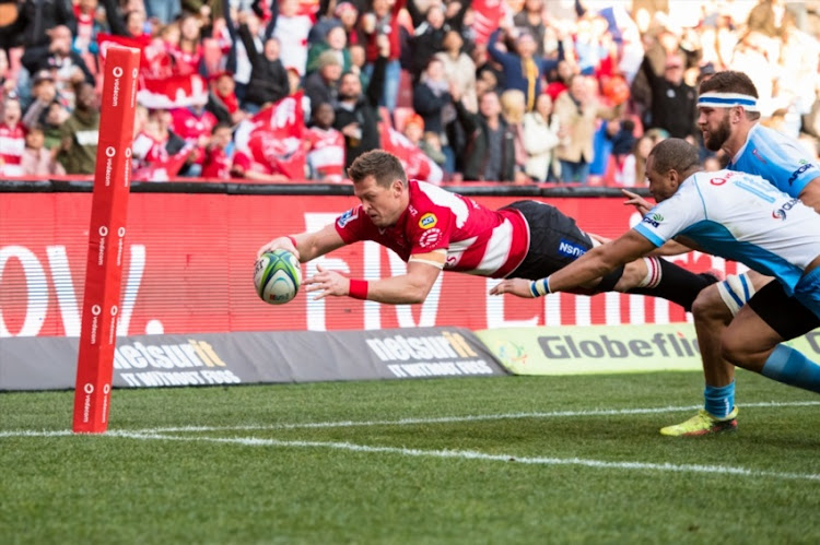 Ruan Combrinck scores a try during the Super Rugby match between Emirates Lions and Vodacom Bulls at Emirates Airline Park on July 14, 2018 in Johannesburg, South Africa.