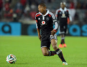 Thabo Qalinge of Orlando Pirates during the Absa Premiership match between Orlando Pirates and Bidvest Wits at Orlando Stadium on September 13, 2014 in Soweto, South Africa. (Photo by Lefty Shivambu/Gallo Images)