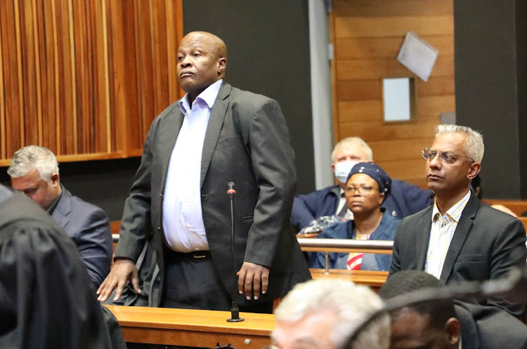Brian Molefe and Anoj Singh appear in the special commercial crimes court at the Palm Ridge magistrate's court in Ekurhuleni on Monday.