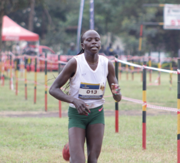 Lilian Kasait runs to the finish line during the Prisons Cross Country Championships held at the Prisons Staff training collage in Ruiru, Nairobi on January 20, 2023