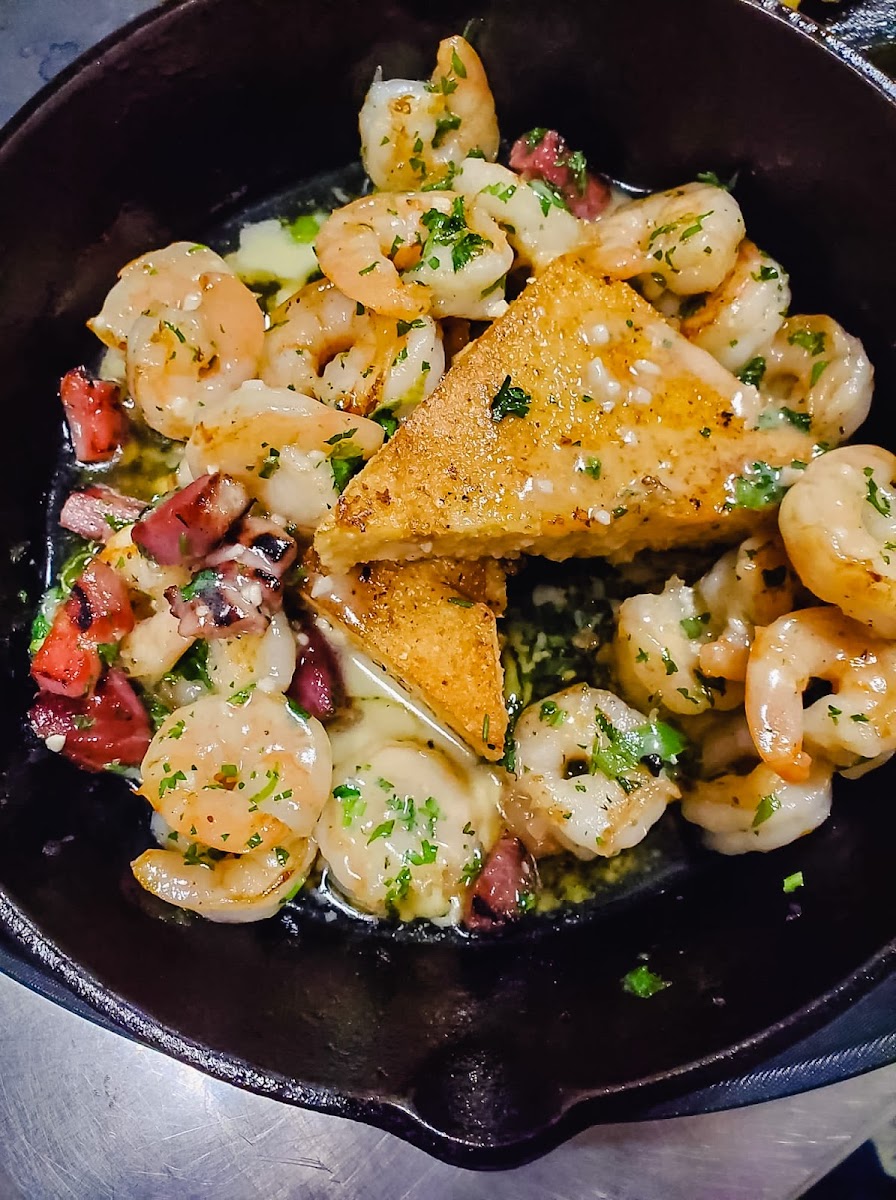 Shrimp and grits, most of their entrees use grits as a side rather than other gluten options