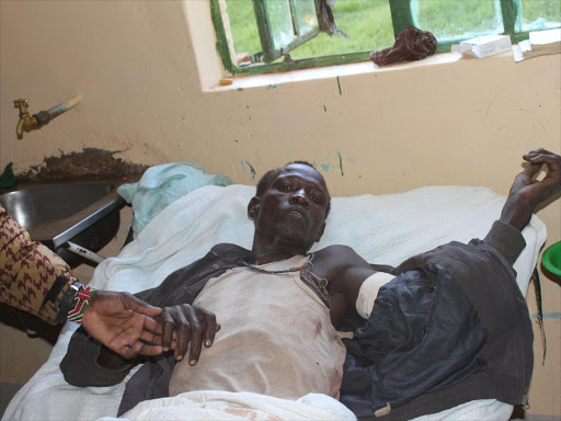 Tugen herder Joseph Chepkangor is treated at Baringo County Referral Hospital after being shot on May 20, 2017. /JOSEPH KANGOGO