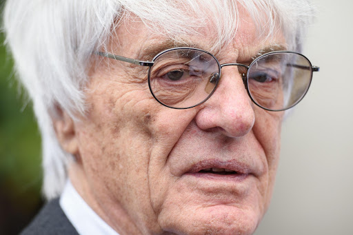 Formula One Group Chief Executive Bernie Ecclestone attends a photocall to launch the "Lost Yeti Hunters" Mongol rally team in London on16 July, 2015. The team will race the 10,000 miles from London to Ulan Bator, Mongolia with the hope of raising money for the Cool Earth, Rett Syndrome Foundation UK and SOS Children charities. AFP PHOTO/Leon Neal