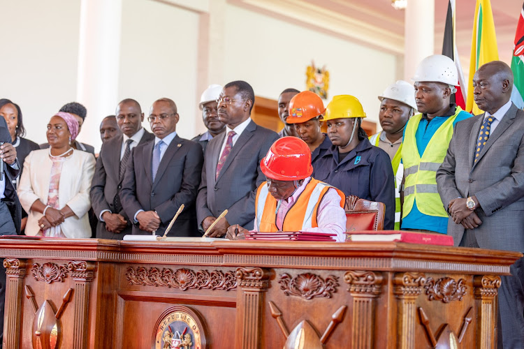 President William Ruto assents to the Affordable Housing Bill at State House, Nairobi on March 19, 2024.