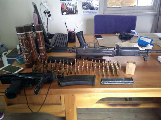 The firearms, ammunations and explosives found at house in Qweqwe Village near Mthatha are displayed. Picture: supplied.