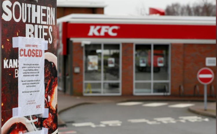 A closed sign hangs at the drive through of the KFC restaurant after problems with a new distribution system in Coalville , Britain, February 19, 2018.