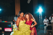 Enhle Mbali Mlotshwa and Shauwn Mkhize celebrating at the end of the runway show