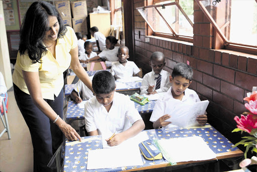 Teachers like Janet Subban of Overport Primary School have to use their initiative Picture: JACKIE CLAUSEN