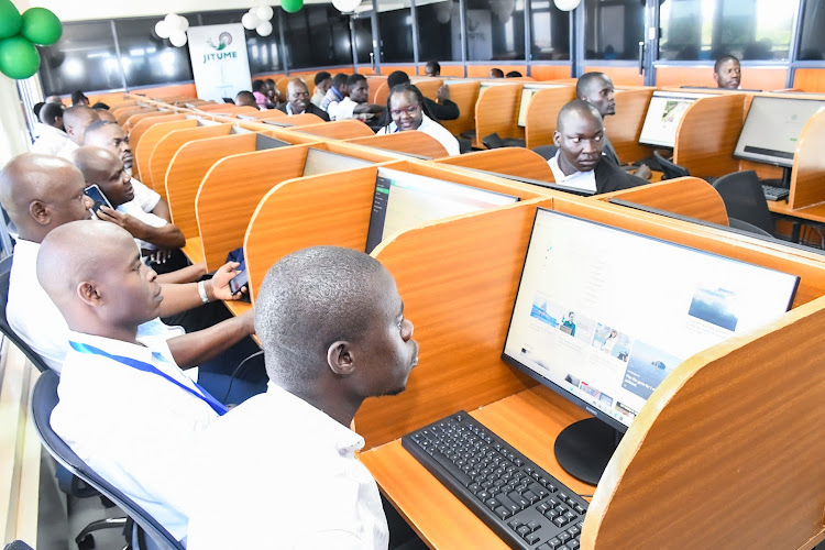 Bungoma County Assembly staff browsing at the digital lab after the launch on April,29,2024.
