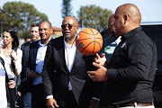 US actor Forest Whitaker and deputy Cape Town mayor Eddie Andrews at the opening of a refurbished basketball court at Cornflower Sports Grounds in Athlone.